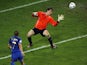 Italian forward Alessandro Del Piero (L) shoots the ball past German goalkeeper Jens Lehmann (R) for his team's second goal in extra time during the World Cup semi-final on July 4, 2006