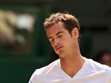 Britain's Andy Murray reacts to losing a point against Bulgaria's Grigor Dimitrov during their men's singles quarter-final match on day nine of the 2014 Wimbledon Championships at The All England Tennis Club in Wimbledon, southwest London, on July 2, 2014
