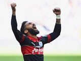 Armand Traore of Queens Park Rangers celebrate after his side wins promotion to the Premier league following their victory in the Sky Bet Championship Playoff Final between Derby County and Queens Park Rangers at Wembley Stadium on May 24, 2014