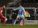 Blair Adams of Coventry City in action during the FA Cup with Budweiser Second Round Replay between Coventry City and Hartlepool United at Sixfields Stadium on December 17, 2013 