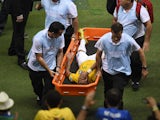 Brazil's forward Neymar is carried on a stretcher after he was injured following a tackle during the quarter-final football match between Brazil and Colombia at the Castelao Stadium in Fortaleza during the 2014 FIFA World Cup on July 4, 2014