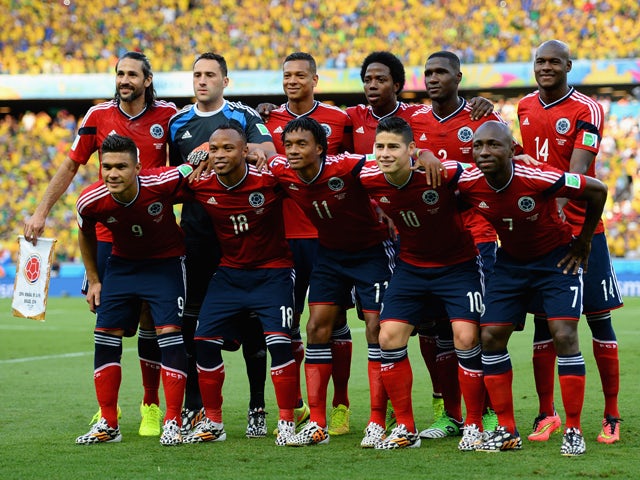 Colombia pose for a team photo prior to the 2014 FIFA World Cup Brazil Quarter Final match between Brazil and Colombia at Castelao on July 4, 2014