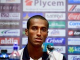 Costa Rica's defender Roy Miller speaks during a press conference after a training session in Santos on June 16, 2014