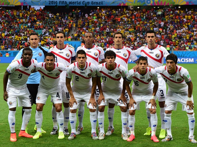 Members of the Costa Rica's national team  pose for the team photo prior to the quarter-final football match between the Netherlands and Costa Rica at the Fonte Nova Arena in Salvador during the 2014 FIFA World Cup on July 5, 2014