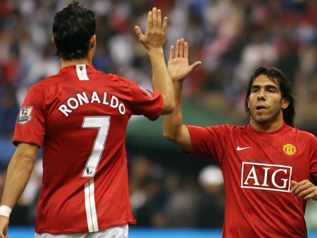 Cristiano Ronaldo and Carlos Tevez celebrate the latter's goal for Manchester United on January 21, 2008.