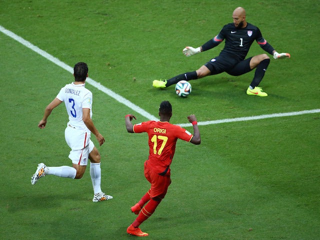 Divock Origi of Belgium shoots against Tim Howard of the United States during the 2014 FIFA World Cup Brazil Round of 16 match on July 1, 2014