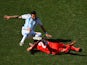 Ezequiel Lavezzi of Argentina is challenged during the World Cup round of 16 match against Switzerland in Sao Paulo on July 1, 2014