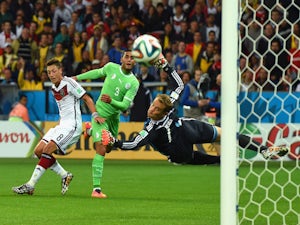 Faouzi Ghoulam of Algeria attempts a shot at goal during the 2014 FIFA World Cup Brazil Round of 16 match between Germany and Algeria at Estadio Beira-Rio on June 30, 2014