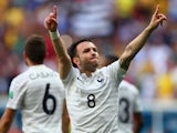 Mathieu Valbuena of France celebrates his team's secong goal on an own goal by Joseph Yobo of Nigeria during the 2014 FIFA World Cup Brazil Round of 16 match between France and Nigeria at Estadio Nacional on June 30, 2014