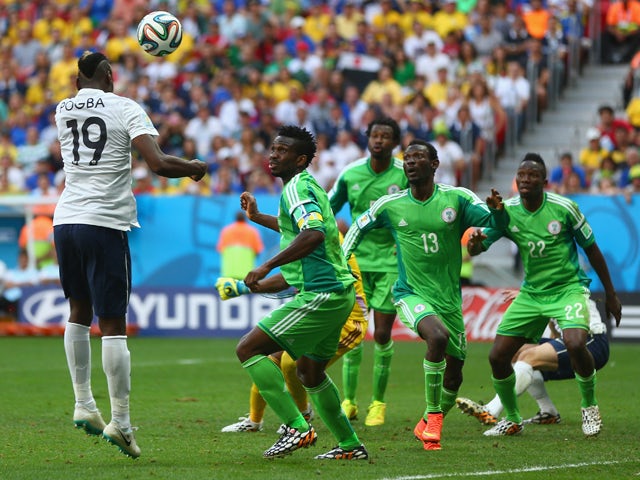 Paul Pogba of France scores his team's first goal on a header during the 2014 FIFA World Cup Brazil Round of 16 match between France and Nigeria at Estadio Nacional on June 30, 2014