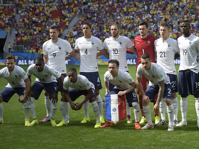 French players pose for a group picture before the round of 16 football match between France and Nigeria at the Mane Garrincha National Stadium in Brasilia during the 2014 FIFA World Cup on June 30, 2014