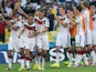 Germany's team celebrate after winning the quarter-final football match between France and Germany 1-0 at the Maracana Stadium in Rio de Janeiro during the 2014 FIFA World Cup on July 4, 2014