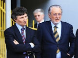 Watford owner Giampaolo Pozzo (C) and son Gino look on during a game between their side and Leeds United on May 4, 2013