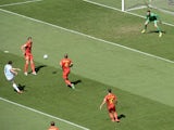 Argentina striker Gonzalo Higuain scores the opening goal of the 2014 World Cup quarter-final against Belgium in Brasilia on July 5, 2014
