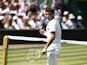 Bulgaria's Grigor Dimitrov reacts to winning the first set against Britain's Andy Murray during their men's singles quarter-final match on day nine of the 2014 Wimbledon Championships at The All England Tennis Club in Wimbledon, southwest London, on July 