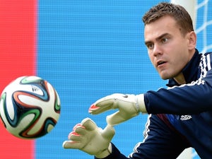 Akinfeev suffers 'minor burns' from flare