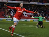 Jim O'Brien of Barnsley celebrates scoring the opening goal during the FA Cup Third Round match between Barnsley and Coventry City at Oakwell on January 4, 2014