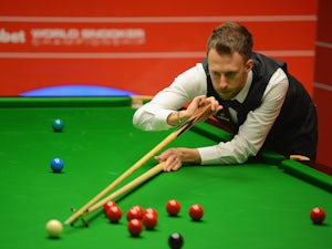 Trump eases past Ding to reach semi-finals