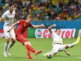 Belgium's midfielder Kevin De Bruyne scores during the first half of extra-time in the Round of 16 football match against USA on July 1, 2014