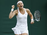 Czech Republic's Lucie Safarova celebrates winning her women's singles fourth round match against Czech Republic's Tereza Smitkova on day seven of the 2014 Wimbledon Championships at The All England Tennis Club in Wimbledon, southwest London, on June 30, 