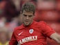 Martin Cranie of Barnsley plays the ball during a pre-season friendly against Club Brugge at Oakwell Stadium on July 12, 2013