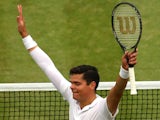 Milos Raonic of Canada celebrates after winning his Gentlemen's Singles quarter-final match against Nick Kyrgios on July 2, 2014