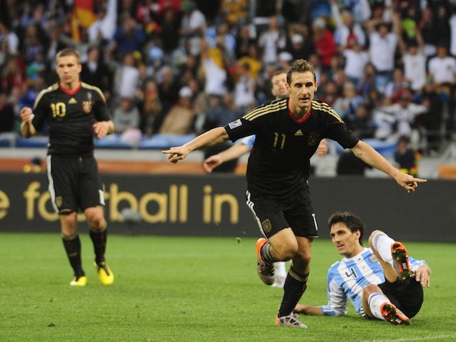 Germany's striker Miroslav Klose celebrates after scoring the team's fourth goal against Argentina during the 2010 World Cup quarterfinal football match on July 3, 2010