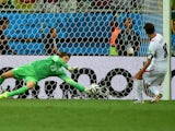Netherlands' goalkeeper Tim Krul saves Costa Rica's forward and captain Bryan Ruiz shot during the second period of extra time in the quarter-final football match between the Netherlands and Costa Rica at the Fonte Nova Arena in Salvador during the 2014 F