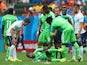 Ogenyi Onazi of Nigeria reacts after a challenge by Blaise Matuidi of France as referee Mark Geiger looks on during the 2014 FIFA World Cup Brazil Round of 16 match between France and Nigeria at Estadio Nacional on June 30, 2014