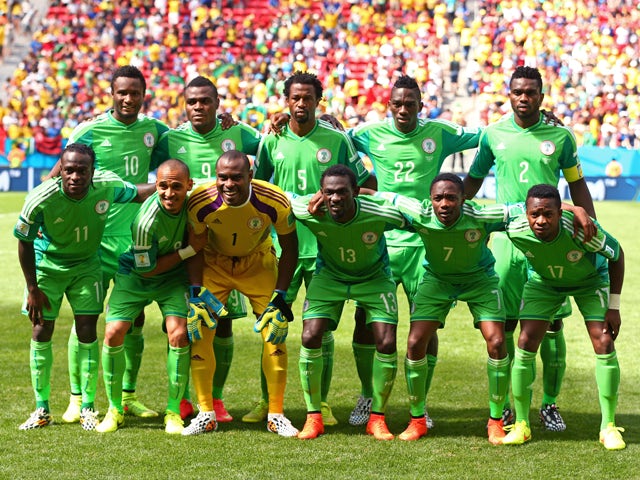 Nigeria pose for a team photo prior to the 2014 FIFA World Cup Brazil Round of 16 match between France and Nigeria at Estadio Nacional on June 30, 2014
