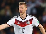 Per Mertesacker of Germany celebrates his team's second goal in extra time during the 2014 FIFA World Cup match against Algeria on June 30, 2014