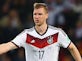 Mertesacker expecting Germany response