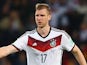 Per Mertesacker of Germany celebrates his team's second goal in extra time during the 2014 FIFA World Cup match against Algeria on June 30, 2014