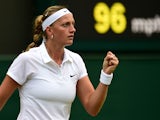 Czech Republic's Petra Kvitova reacts after winning a game against China's Peng Shuai during their women's singles fourth round match on day seven of the 2014 Wimbledon Championships at The All England Tennis Club in Wimbledon, southwest London, on June 3