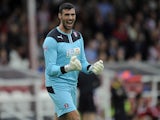 Scott Shearer of Rotherham United celebrates the opening goal during the Sky Bet League One match between Brentford and Rotherham United at Griffin Park, on October 05, 2013