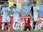 Switzerland's defender Stephan Lichtsteiner (C) reacts after Switzerland missed a chance at the end of a Round of 16 football match against Argentina on July 1, 2014