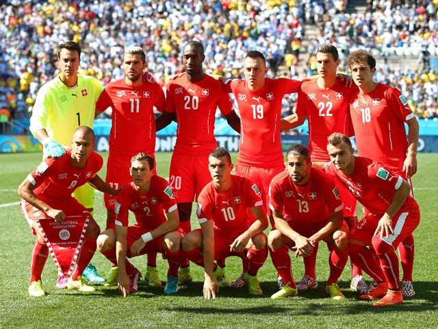 Switzerland players pose for a team photo prior to the 2014 FIFA World Cup Brazil Round of 16 match between Argentina and Switzerland at Arena de Sao Paulo on July 1, 2014