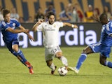 Real Madrid's Tomas Mejias is covered by Chelsea's Marko van Ginkle (L) and Ramires during the 2013 International Champions Cup match between Real Madrid and Chelsea on August 7, 2013