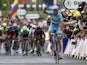 Italy's Vincenzo Nibali celebrates as he crosses the finish line at the end of the 201 km second stage of the 101th edition of the Tour de France cycling race on July 6, 2014 between York and Sheffield