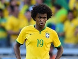 Brazil's Willian watches the penalty shootout between his side and Chile on June 28, 2014