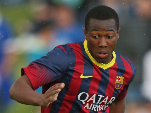 Adama Traore of FC Barcelona during the UEFA Youth League Semi Final match between Schalke 04 and FC Barcelona at Colovray Stadion on April 11, 2014