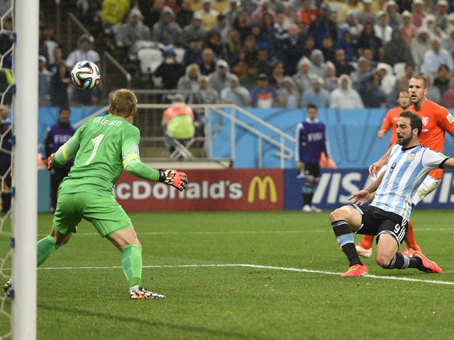 Argentina's forward Gonzalo Higuain takes a shot on goal during the semi-final football match between Netherlands and Argentina of the FIFA World Cup at The Corinthians Arena in Sao Paulo on July 9, 2014