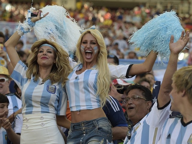 Argentina's fans cheer prior to the 2014 FIFA World Cup final football match between Germany and Argentina at the Maracana Stadium in Rio de Janeiro, Brazil, on July 13, 2014
