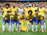 Brazil's players lineup before their semi final against Germany on July 8, 2014