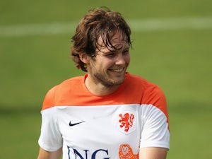 Daley Blind laughs during a training session for the Netherlands national team for the 2014 FIFA World Cup in Brazil at the Estadio Jose Bastos Padilha Gavea on July 2, 2014.
