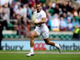 Dan Norton of England breaks away to score a try during the Marriot London Sevens match between England and Argentina at Twickenham Stadium on May 10, 2014 in London, England