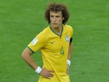 Brazil's defender and captain David Luiz reacts during the semi-final football match between Brazil and Germany at The Mineirao Stadium in Belo Horizonte during the 2014 FIFA World Cup on July 8, 2014