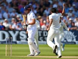 England captain Alastair Cook leaves the crease after being bowled by Mohammed Shami for 5 runs during day two of the 1st Investec Test Match between England and India at Trent Bridge on July 10, 2014