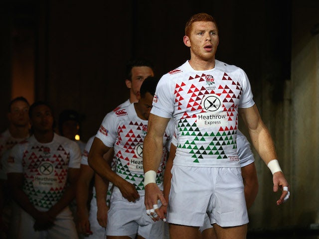 James Rodwell of England leads players onto the field during the Pool C match between England and Argentina during day one of the 2014 Hong Kong Sevens on March 28, 2014