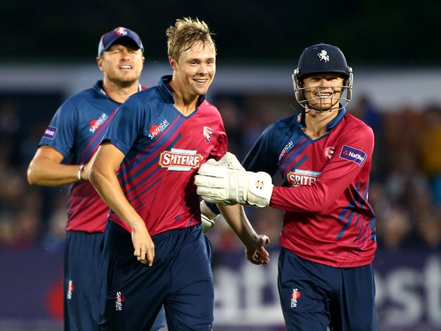 Fabian Cowdrey of Kent celebrates with Sam Billings after taking the wicket of Matthew Machan of Sussex during the Natwest T20 Blast match between Sussex Sharks and Kent Spitfires at TheBrightonAndHoveJobs.com County Ground on July 11, 2014